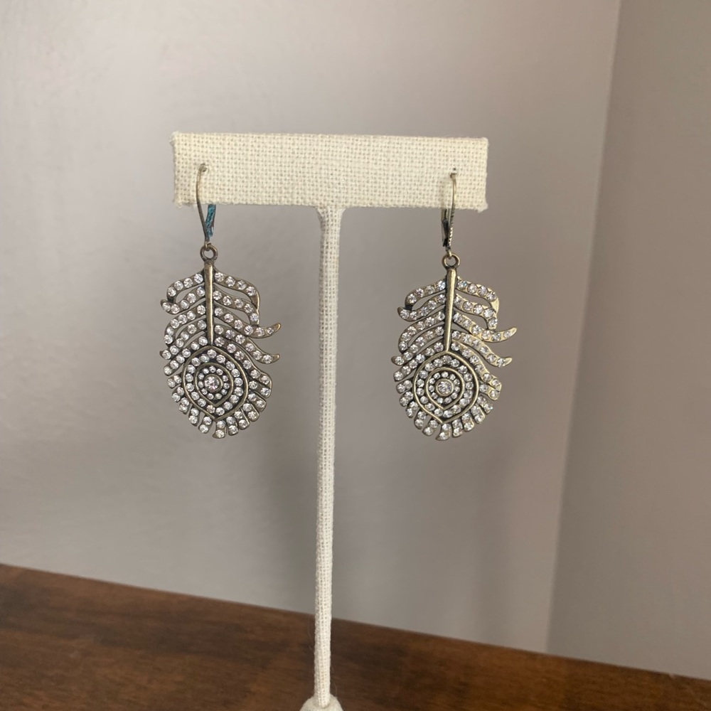 Leaf earrings most likely Avon. Pierced brasstone with rhinestones